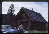 Ivan Doig in front of Annick Smith's cabin