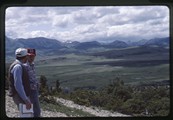 Ivan Doig and Gary Hammond looking west from atop Pine Butte