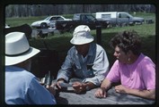 Polebridge, Montana - Ivan Doig sitting with Jerry DeSanto and Karen Feather