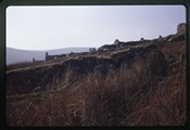 Slievemore, Ireland - Ruins of stone buildings in a line