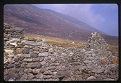 Slievemore, Ireland - Stone walls in front of a Mountain side