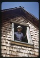 Ivan Doig in upper window of D. L. Doig homestead - slide