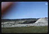 Colstrip, Montana - coal bed in strip mine behind power lines