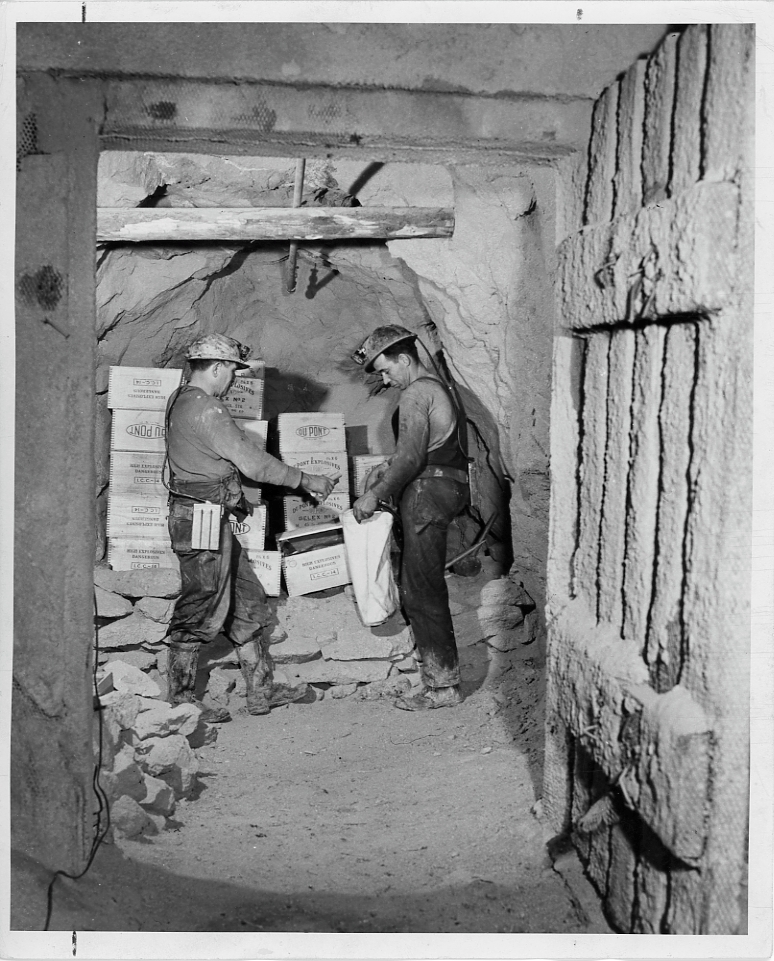 Butte miners counting out powder for blast