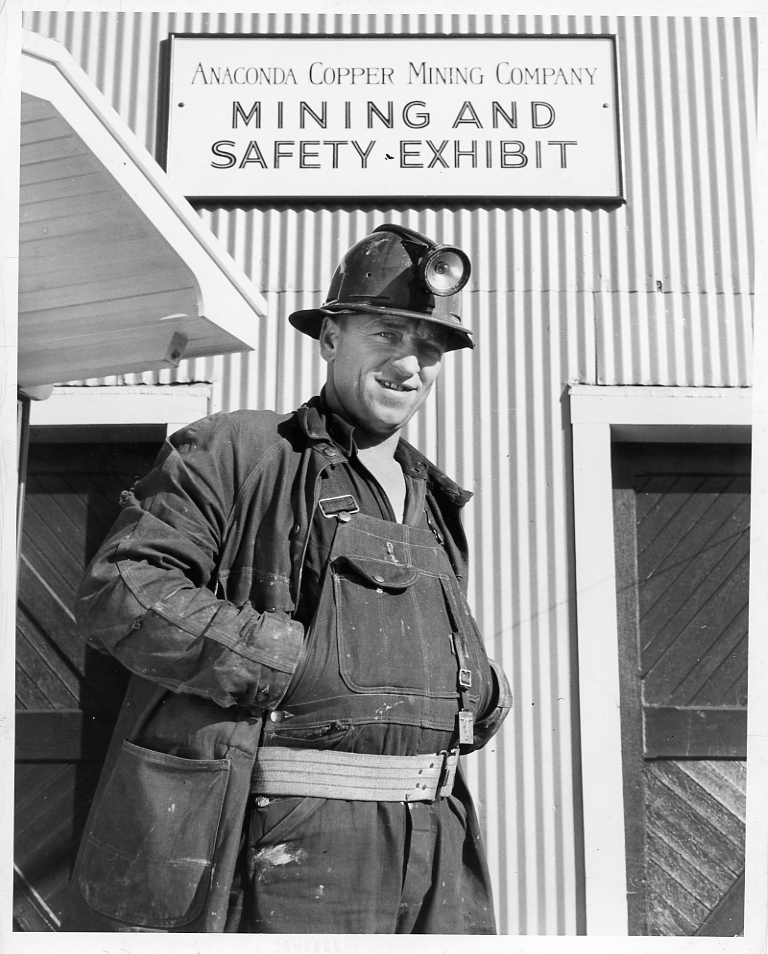 Jimmy Doran showing safety equipment and miner's gear