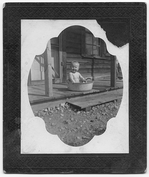 Baby Sitting In Small Tub, Unknown Location
