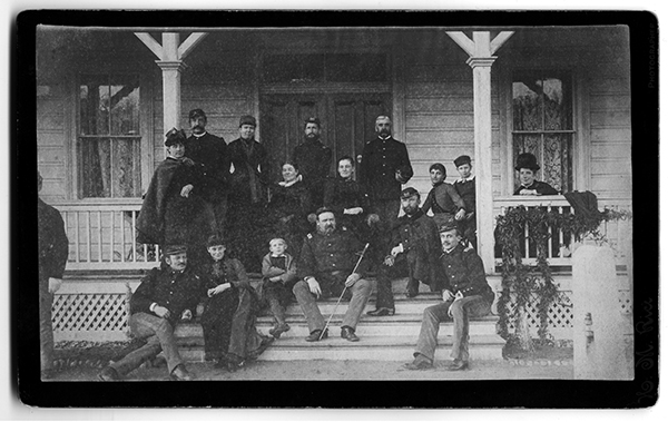 Officers and Families Group Photo on Porch, Fort Spokane, Washington Territory