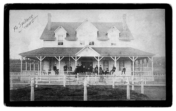 Officers and Families Group Photo on Porch, Fort Spokane, Washington Territory