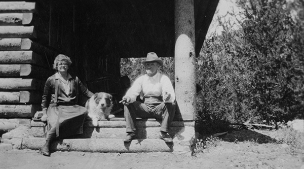 Pete and Jennie Karst with Dog at Karst Kamp and Stage Stop, Gallatin Canyon, Montana