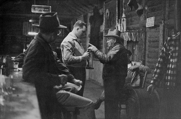 Pete Karst with Friends in Saloon at Karst Kamp and Stage Stop, Gallatin Canyon, Montana