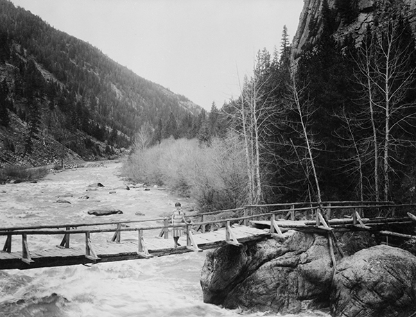 Isabelle Karst Durnam Standing on Bridge Over Gallatin River, Gallatin Canyon, Montana