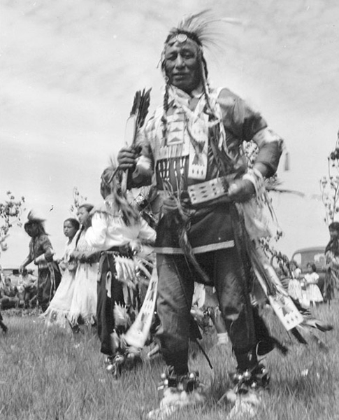 Gust Rock, Assiniboine Indian, in Costume, Unknown Location