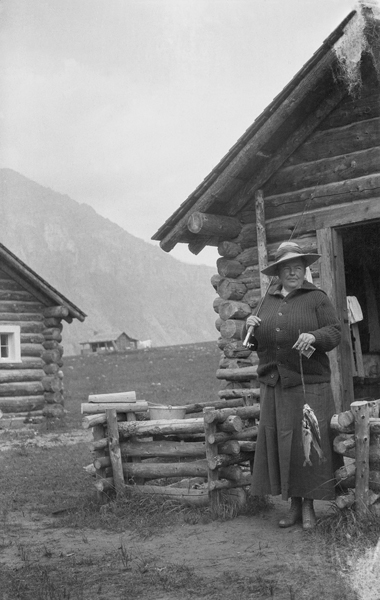 Woman Holding A String of Fish at East Rosebud Lake, Beartooth Mountains, Montana