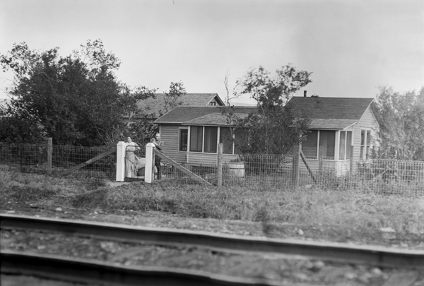 Charles Reader and Wife in Front of House, Lennep, Montana