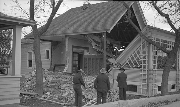 Three Men Viewing Earthquake Damage, Helena, Montana