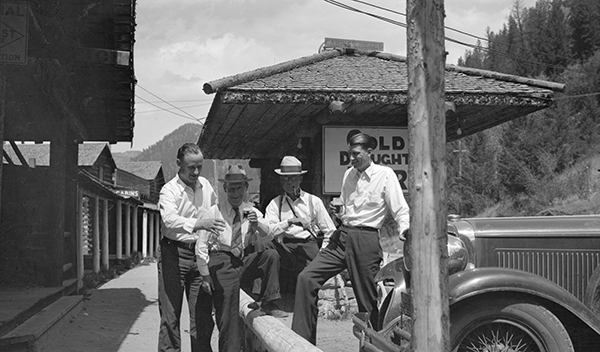 Four Men Drinking Beer, Unknown Location