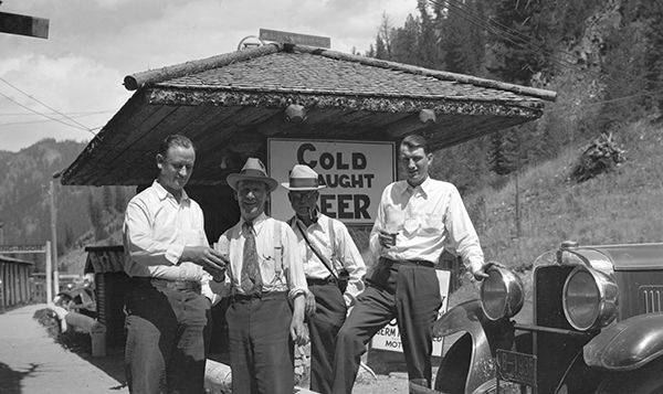 Four Men Drinking Beer, Unknown Location