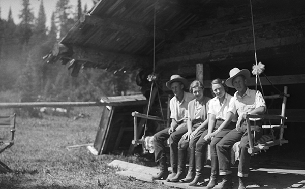 Four People Sitting on Swing, Unknown Location, Montana