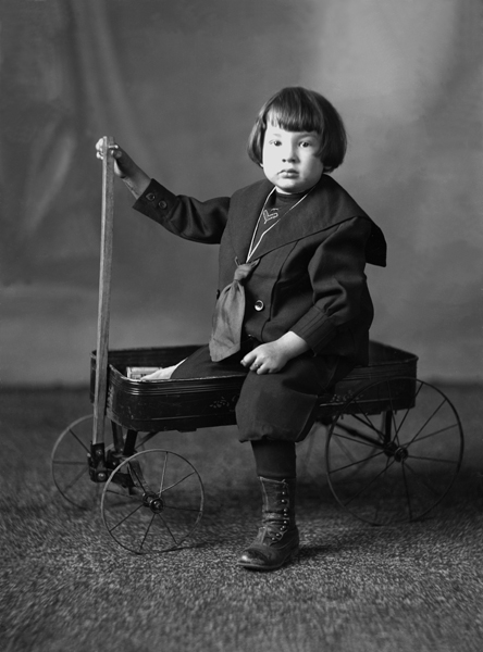 Studio Portrait of Alfred Chris Schlechten, Jr., in Wagon, Bozeman, Montana
