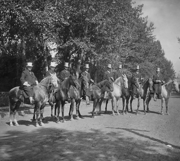 Men on Horseback Preparing for Sweet Pea Parade, Bozeman, Montana