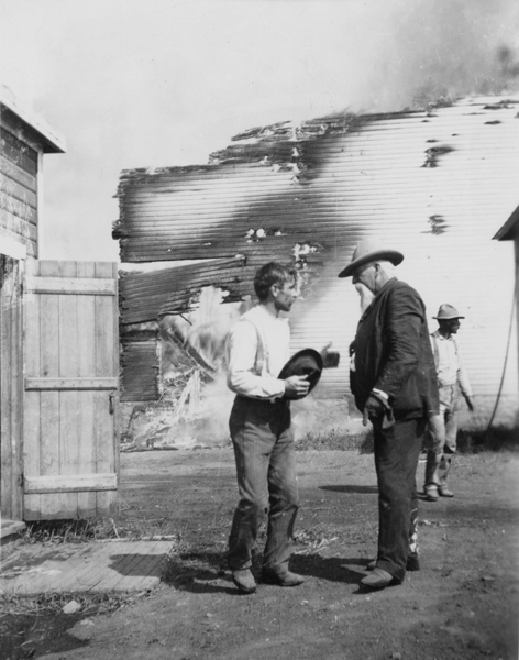 Nelson Story, Sr., Talking to Employee During The Flour Mill Fire, Bozeman, Montana