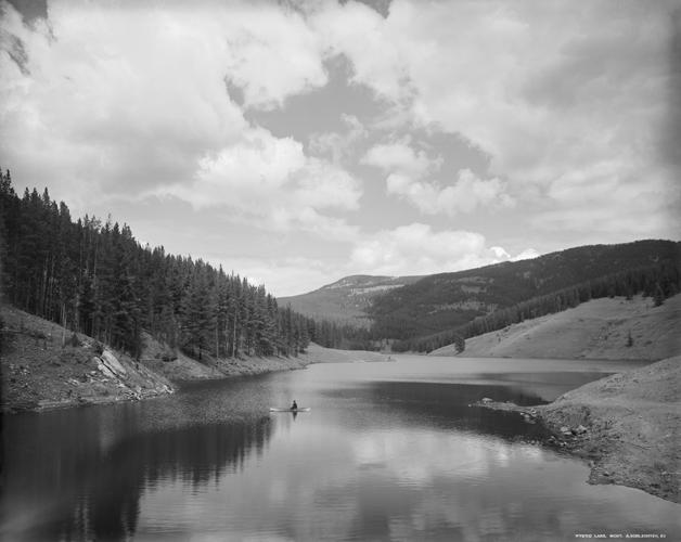 Person In Canoe on Mystic Lake, Hyalite Mountains, South of Bozeman, Montana