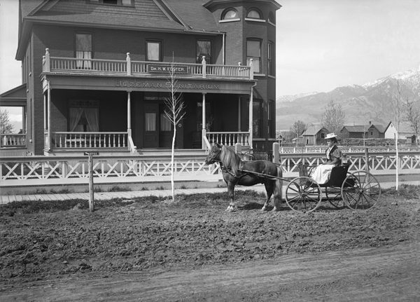 Mabel Foster in Buggy in Front of the Bozeman Sanitarium, Bozeman, Montana