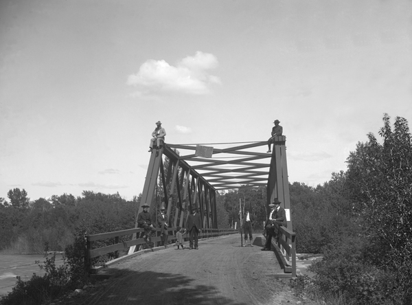 Group Posing on Bridge Over the West Gallatin River, Salesville, Montana