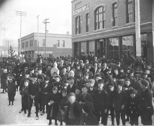 Crowd of Children on Main Street Waiting For Santa Claus, Bozeman, Montana