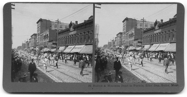Boston and Montana Band in Parade, Elks Day, Butte, Montana