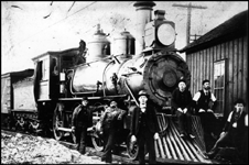 NP 537, 2-6-0 at Duluth, MN.  There are six people in the picture all on the ground, two appear to be crewmen, three are in suits or with a tie, and one hard to tell.  This engine was later renumbered 451.