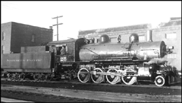 NP 25, a 2-8-0 at Missoula, MT with engineer in cab