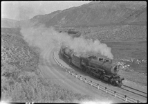 NP 1648, Class W and NP 1548 Class W, double heading entering Gardiner, MT with Park Help special  
