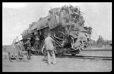 Rear of damaged cab of NP 2238, Class Q-5 at Whitehall after being rerailed at the Blackstone, MT derailment of Train No. 41 where derailment was caused by switch being opened by 11 year old boy.