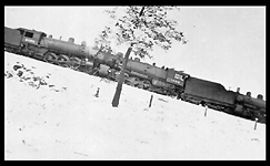 Train No. 220, with NP 2120, Class Q-1 crashed head on into Train No. 1, with NP 1750, Class W-3 and NP 2225, Class Q-4 at Welch, MT.  Two men were killed including fireman Caldwell of NP 2120.  Accident was caused by NP 2120 crew overlooking train orders. This photo shows all three locomotives.