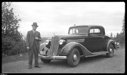 Seattle Relay Office, H. J. Briggs, Mgr., with new car. Photograph taken at Longview, WA.