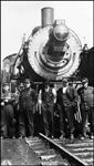 NP 129, Class S-2c at Glendive with crew and mechanics gathered together for photograph.