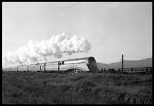 NYC X2847W arriving Whitehall  6/36 RF 3/4 view of Rexall Streamliner demonstration train at speed.  Last few cars cropped  Fence line Mountains in background  See RVN03673-4,6