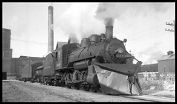 Midland Continental Railroad 4-4-0  No.309 with large shop built snowplow. In 1943 they had 3-engines, 2-freight cars and 4-passenger cars,and 43 employees