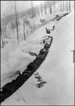 Plowing out Wallace branch  1915-1916  Orig Cuplin from G  B  Noll  NP 1223  The exact location is not given, but there are several places on the 4% grade over Lookout Pass where lower level track can be observed from higher level track