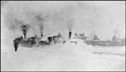 Montana RR  Three engines in snowdrift  Lewistown Mont 1903  Copy negative from LeFever  The Montana RR was initially under NP control, leaving the NP at Lombard and making its way up 16 mile creek canyon  It eventually became part of the MILW  main line  It was nicknamed 