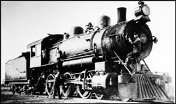 NP 1313, Class S-3, being serviced by the train crew at an unknown location