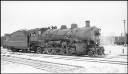 NP Class W-2 2-8-2 no. 1919 in yard service at Dickinson, North Dakota. Alco built this engine in July 1905 under construction no. 31134 as a tandem compound, and NP numbered it 1619. NP converted it to a simple expansion locomotive and renumbered it from 1619 to 1919 in July 1912. Shop forces dismantled this engine at Brainerd, Minnesota, in 1958. In the early 1950s, Dickinson crews liked Class W-2s for yard service, especially sister engine no. 1917, but it was destroyed in a head-on collision at Wibaux, Montana, on September 20, 1954.