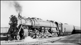 NP 2687, Class A-5 passes the freight house platform in Livingston, MT.