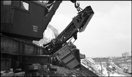 NP wrecker 47, overturned just east of Missoula. Wrecker  47 had been called to pick up a derailed gondola just east of Missoula, but insufficient blocking of wrecker 47 caused it to tip over onto the gondola. A small wrecker from the Missoula car shop assisted wrecker 27 in picking up wrecker 47. Wreckers 45 and 47, new 250-ton 