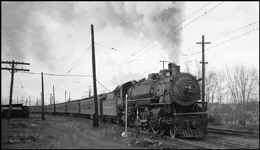 NP Passenger Extra 2235 East on Miwaulkee Road track leaves Missoula. The reason for the detour is the derailment on the NP, east of Missoula, of wrecker no. 47. (See RVN 09581-09595). Engineer Marcellus 