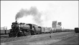 NA Train No. 1 with NA 102, 2-10-0 Decapod locomotive leaving Edmonton, AB.