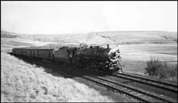 NP Train No. 1 with NP 2610, Class A, Engr. Jeffery and NP 1761, Class W-3, Engr. Dickman at Nagos, MT.
