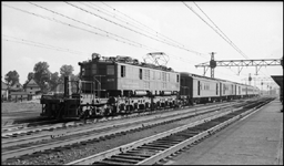 NYC train pulled by Cleveland Union Terminal Electric Locomotive No. 217 at Linndale, OH.