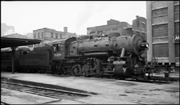 NYC 7457 coupled to passenger run at Depot platform in Albany, NY
